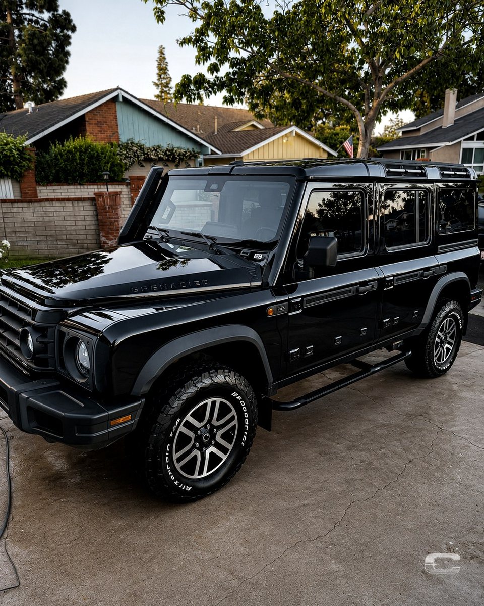 Black Ineos Grenadier after a full detail — deep gloss finish
